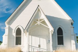 Outside a white painted church